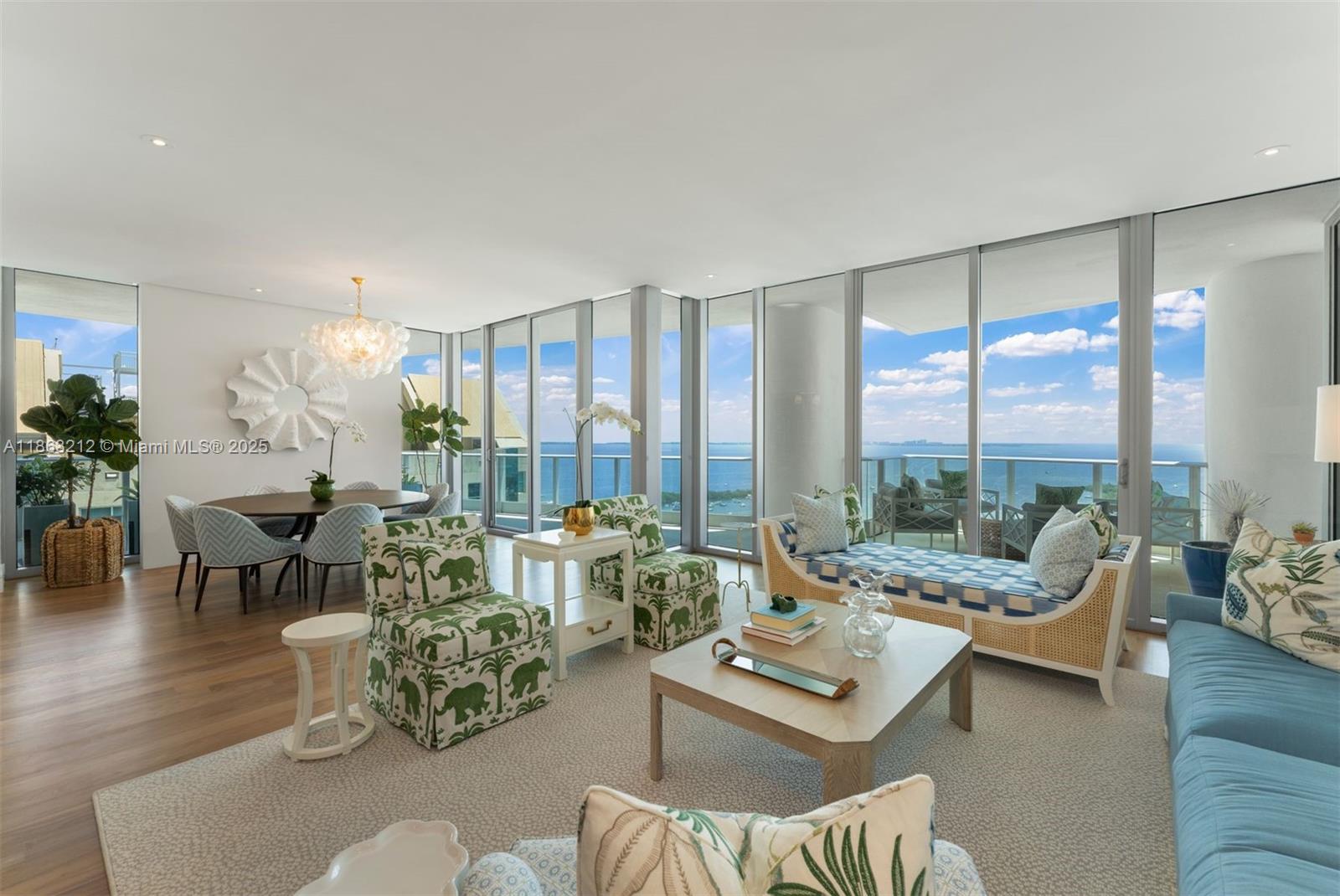 Experience luxury Bayfront living in this 3 BD, 3.5 BA Penthouse, 4,370 SF corner residence at the prestigious Grovenor House. Completely remodeled and accessible by private elevator into a grand foyer, this home boasts soaring ceilings, floor to ceiling impact windows/doors, wraparound terraces with 180° Bay and Skyline views, and custom architectural details throughout. The open-concept kitchen features Snaidero cabinetry, marble counters, butler’s pantry, and top-tier appliances. Brand new Creston smart system, automated blinds, Sonos audio, and Lutron lighting elevate everyday living. The expansive main suite offers a sitting area, custom walk-in closet, spa-like bath, and balcony access. Building amenities include infinity pool, spa, gym, tennis, dog park, playground, creche and more.