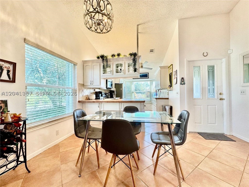 Photo of 11078 SE Sea Pines Cir, Hobe Sound, FL 33455 (MLS # A12041107)