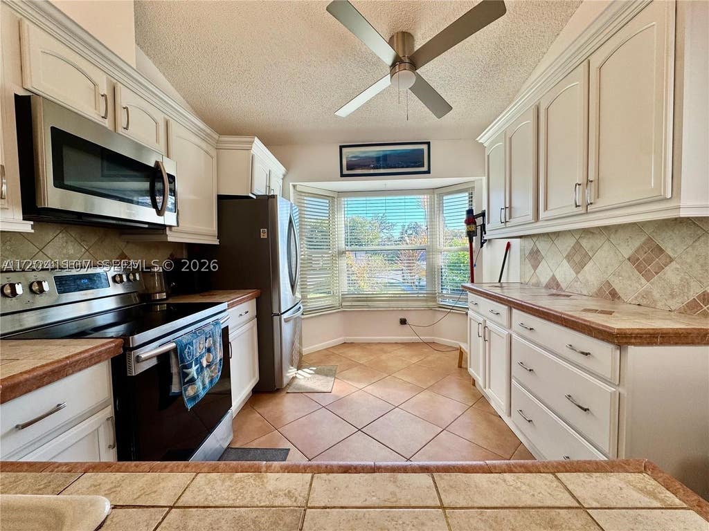 Photo of 11078 SE Sea Pines Cir, Hobe Sound, FL 33455 (MLS # A12041107)