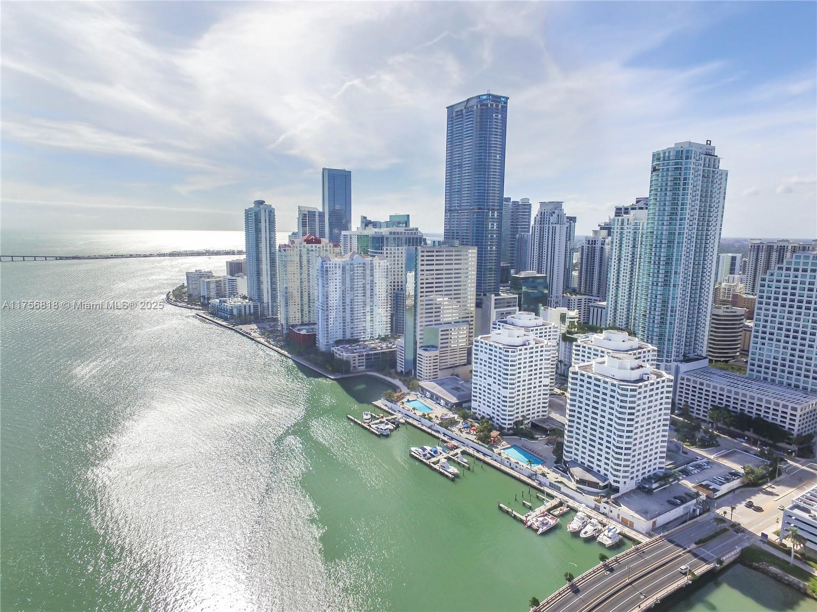FANTASTIC FOUR AMBASSADORS, Gorgeous 2/2 Exceptional opportunity to become a Brickellista with one of the best locations in all of Miami, and at a fantastic price!! Located at ‘Ground Zero’, right in the heart of Miami on World Famous Brickell Avenue fronting Biscayne Bay, just minutes to downtown, Coconut Grove, Coral Gables, Miami Beach and the airport. Our building enjoys the famous restaurant/nightclub Delilah, fantastic coffee shop/ grocery, marina, beauty salon, two amazing Olympic sized swimming pools (one heated), gymnasium and much more. Join us and enjoy for yourself the finest restaurants in Miami just steps from our door as well as 2 Luxury shopping malls, Whole Foods & 3 Publix supermarkets to choose from, all within walking distance! Absolutely the best value on Brickell!