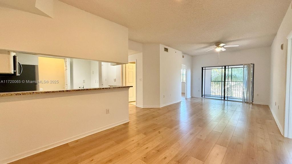 Photo of 2810 Grande Pkwy #301, Palm Beach Gardens, FL 33410 (MLS # A11720065)