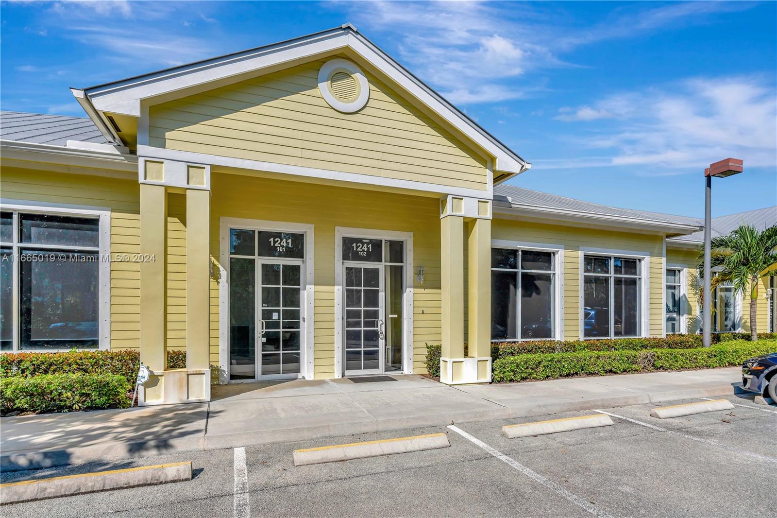 Move-in Ready Office/Retail/Professional space in Stuart - Fully updated, Prime Location. This modern office space is perfect for your business. Sawgrass Business Center is active and diverse with Key West style CBS Construction and Metal Roofs. Enjoy a fully built-out interior featuring brand new Luxury vinyl plank flooring, a new air conditioner and fresh paint. As you enter, you'll be greeted by a reception room with waiting area, a large conference room, private executive office, associates workspace, designated lounge area with kitchenette and ADA compliant bathroom. Ample parking and available exterior and window signage make your business easy to find. Centrally located in a bustling area of Stuart, Florida, this sought after location offers excellent accessibility and visibility.