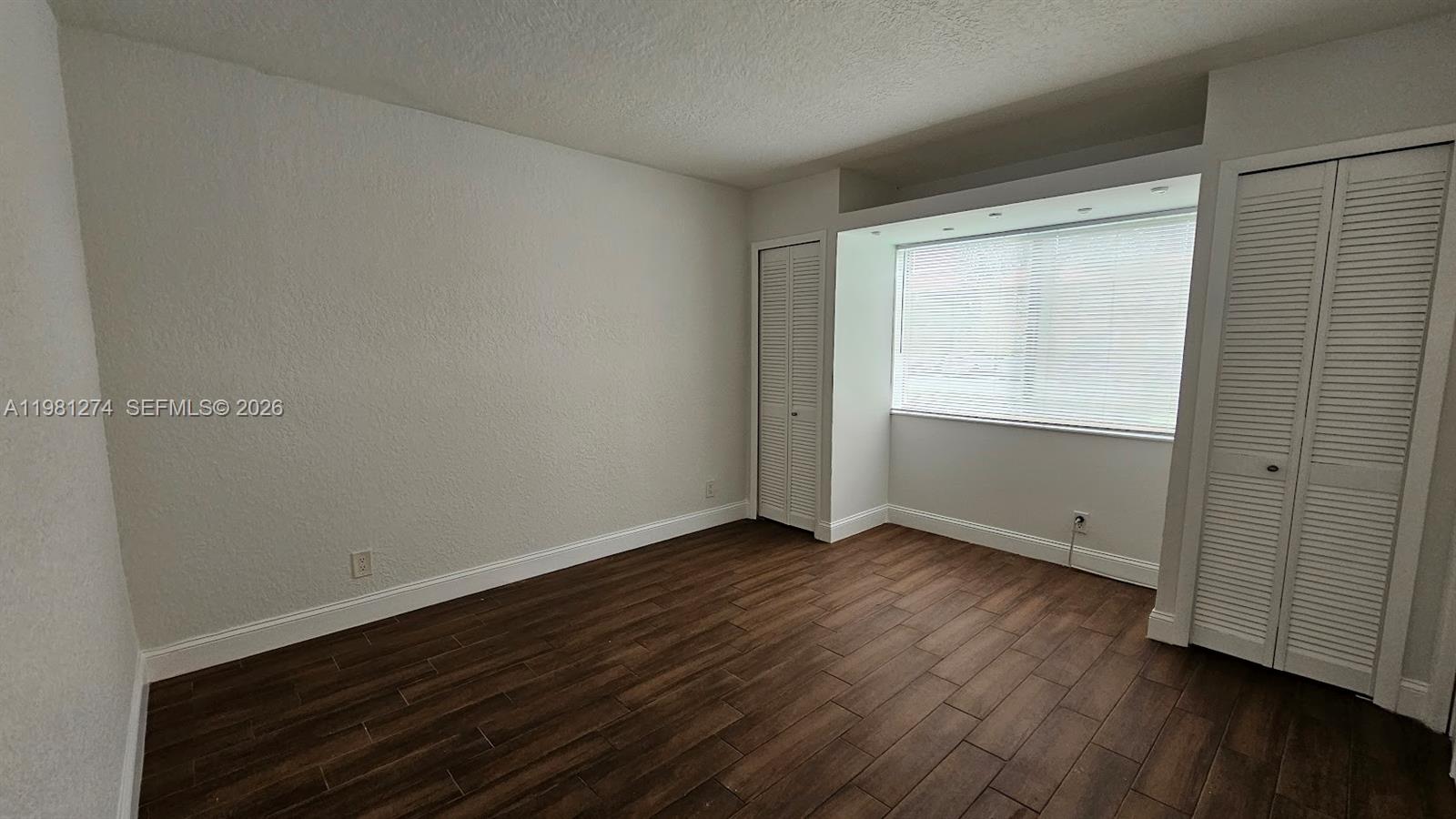 RACQUET CLUB APARTMENTS A - Residential Lease