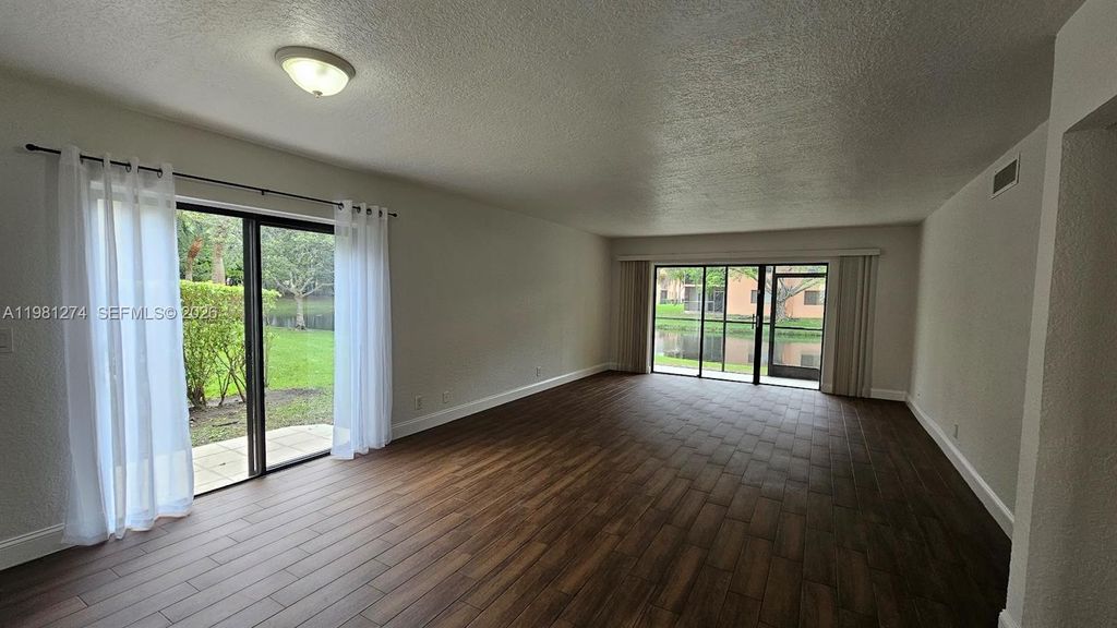 Photo of 305 Lakeview Dr #101, Weston, FL 33326 (MLS # A11981274)