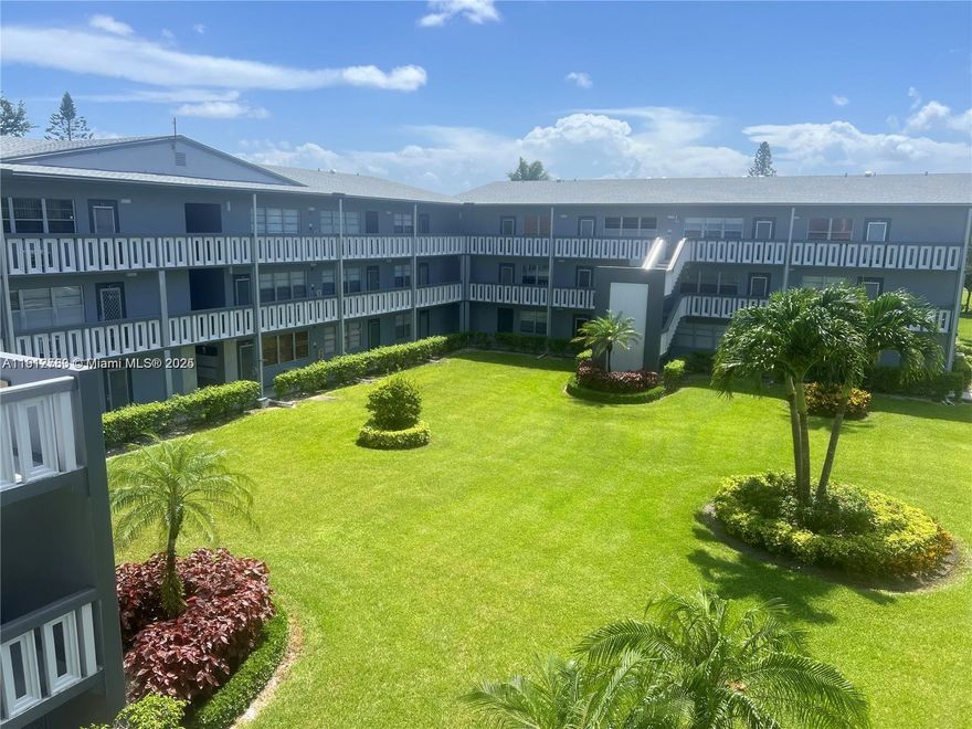 CORNER BRIGHT AND LIGHT SPACIOUS UNIT. THE BUILDING HAS AN ELEVATOR.TILE FLOORS THROUGHOUT COMMON AREAS, 2ND BATH HAS SHOWER. HUGE SCREENED-IN BALCONY WITH GARDEN VIEW. COMMON LAUNDRY IN THE SAME FLOOR. THE CLUBHOUSE OFFERS: TENNIS, SWIMMING, THEATRE, CARD GAMES, BILLIARDS. WALKING DISTANCE TO SATELLITE POOL, CLUBHOUSE, AND HOUSE OFWORSHIP. 2 GATES AND SECURITY PATROLS. INCLUDES WATER AND CABLE AND INTERNET