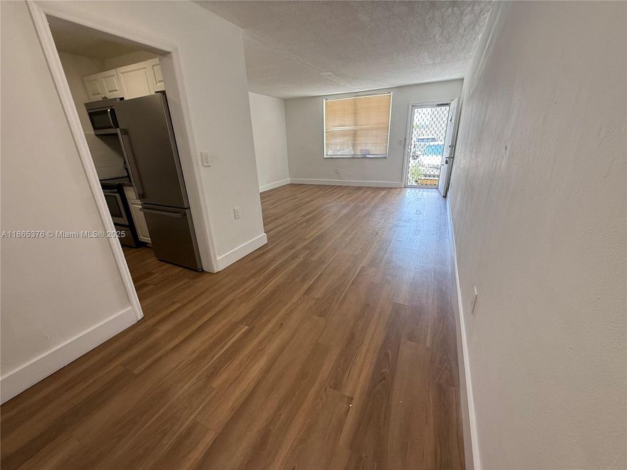 Spacious, bright, renovated first-floor apartment in the heart of North Bay Village. 1 bed, 1 bath. Includes 1 parking space. Community pool. Prime location near shops, transit and new developments; Publix within walking distance. Submit all offers via MLS Offers. The association prohibits rentals for three years. For showings call or text Claudia (Co-Listing) Available now — easy to show; appointments fast and convenient.