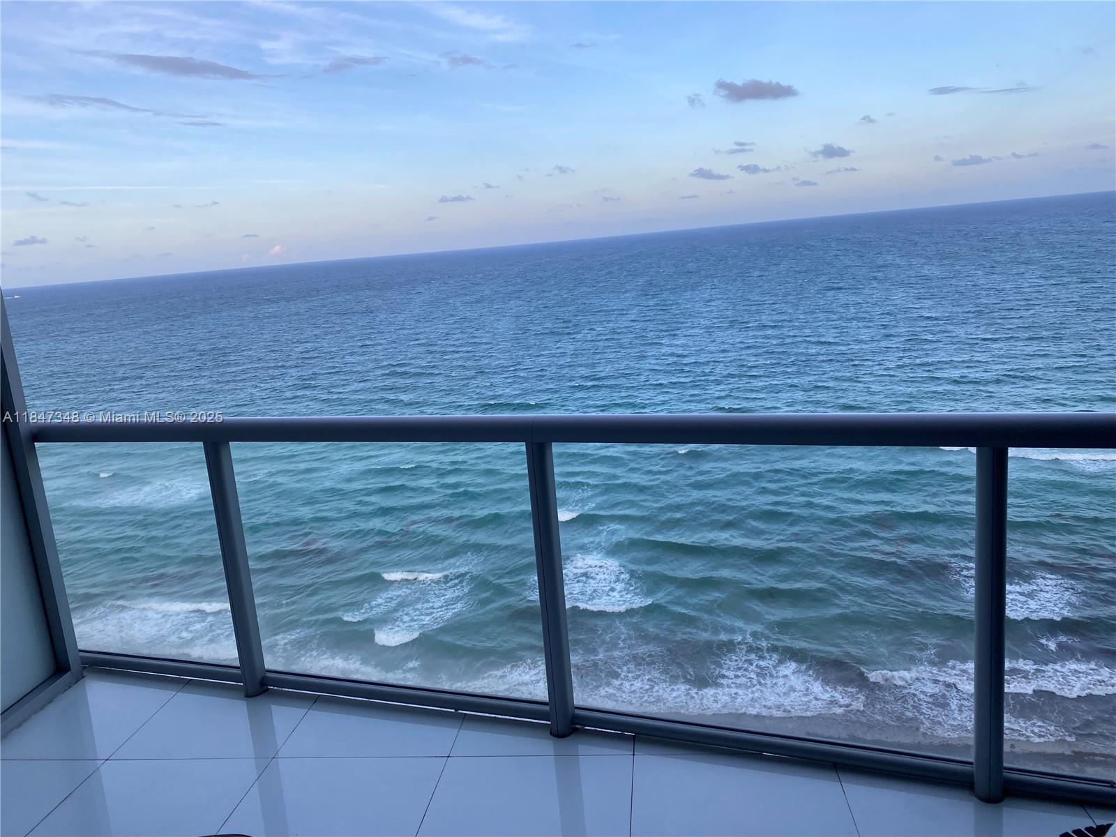 FANTASTIC UNIT IN A LUXURY BUILDING WITH GORGEOUS DIRECT OCEAN VIEWS TURN KEY, FULLY FURNISHED READY TO MOVE IN. PROFESSIONALLY DECORATED WITH HIGH-END MODERN CONTEMPORARY FURNITURE AND STUNNING FINISHES. ONE OF A KIND, INTELLIGENT BLDG WITH HIGH IMPACT GLASS WINDOWS, SUNRISE AND SUNSET POOLS WITH FULL POOL & BEACH SERVICE, FITNESS CENTER, SPA, MOVIE THEATER, CHILDREN'S ROOM, 24 HR SECURITY, VALET, CLOSE TO SHOPS, RESTAURANTS ETC.