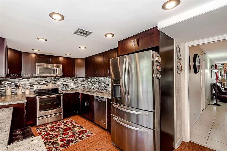 Golf Course & water view condo in desirable Oaks section of Palm Aire Golf community, This large 3 bed/2.5 bath unit has a renovated kitchen w/granite countertops & stainless steel appl., an open dining/living room area, tile & vinyl flooring, full-size washer & dryer, no popcorn ceilings, hurricane windows on south side of unit & shutters on the large screened private balcony.. Water, cable- about 100 channels- & internet incld in monthly maint. Bldg is next to pool, social room & barbecue area. New roof (2025), no pending assessments. One of best located bldgs- near entrance, supermarket, tennis courts, city community center, playground & walking/bike path. Close to major highways. Each tenant to have min 700 credit score. Tenant to pay $500 common area security dep to assoc.