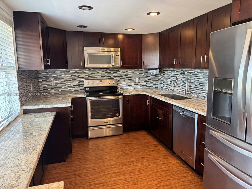 Golf Course & water view condo in desirable Oaks section of Palm Aire Golf community, This large 3 bed/2.5 bath unit has a renovated kitchen w/granite countertops & stainless steel appl., an open dining/living room area, tile & vinyl flooring, full-size washer & dryer, no popcorn ceilings, hurricane windows on south side of unit & shutters on the large screened private balcony.. Water, cable- about 100 channels- & internet incld in monthly maint. Bldg is next to pool, social room & barbecue area. New roof (2025), no pending assessments. One of best located bldgs- near entrance, supermarket, tennis courts, city community center, playground & walking/bike path. Close to major highways. Each tenant to have min 700 credit score. Tenant to pay $500 common area security dep to assoc.