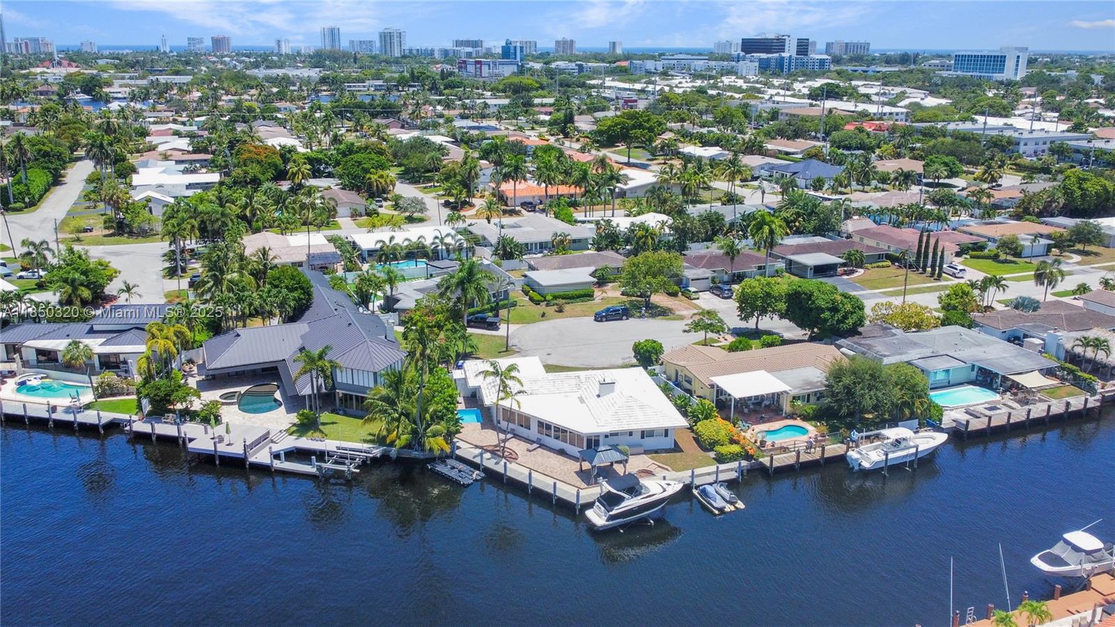 Exquisite Waterfront Living in Pompano Beach! Turnkey & Move-In Ready Set in an exclusive cul-de-sac, this meticulously updated 3-bedroom, 2-bathroom residence offers 2,177Sqft of sophisticated living space, featuring breathtaking, unobstructed panoramic views of the water. Perfect for boating enthusiasts, the property boasts a private dock with a 40ft boat capacity, as well as convenient parking for jet skis. Enjoy quick access to the Intracoastal with just an 8-minute boat ride. Recently upgraded with a brand-new seawall and dock, this home promises worry-free waterfront living. With no pet or rental restrictions and the entire property being turnkey and move-in ready, this is truly a rare opportunity to experience a luxury lifestyle in one of Pompano Beach’s most coveted locations.