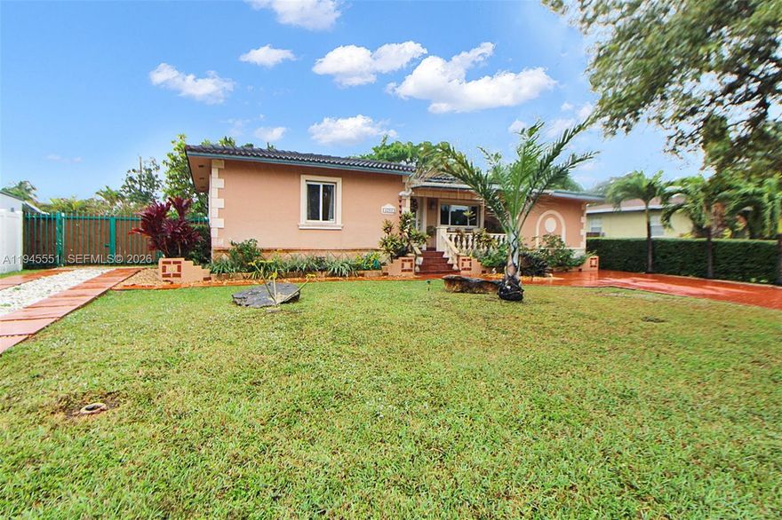 This updated 3-bedroom, 2-bath home in West Miami offers a comfortable layout and a great mix of indoor and outdoor living. Inside, you’ll find an open living area with plenty of natural light, a modern kitchen with updated appliances, and three nicely sized bedrooms. Both bathrooms have been remodeled with clean, contemporary finish. Step outside to a truly special backyard. The tropical garden features brick walkways, beautiful trellises with exotic plants, fruit trees, a koi pond and a fully equipped outdoor kitchen, make it perfect for relaxing or hosting friends and family. Conveniently located close to shopping, dining, and major roads, this home makes everyday living easy and enjoyable. This property offers, 10,500 SF of lot space plenty room for a pool if desired.