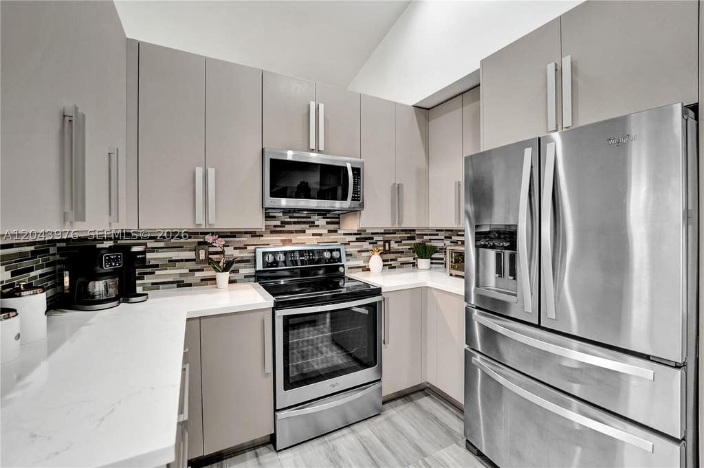 Photo of 4444 Dogwood Cir, Weston, FL 33331 (MLS # A12043976)