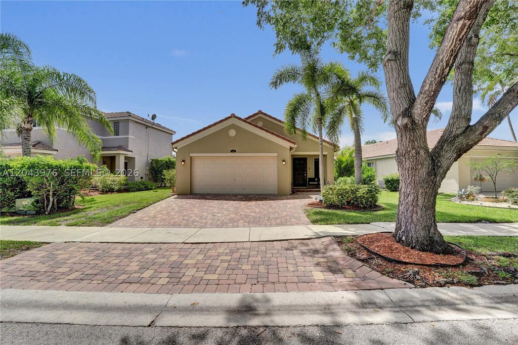 Photo of 4444 Dogwood Cir, Weston, FL 33331 (MLS # A12043976)