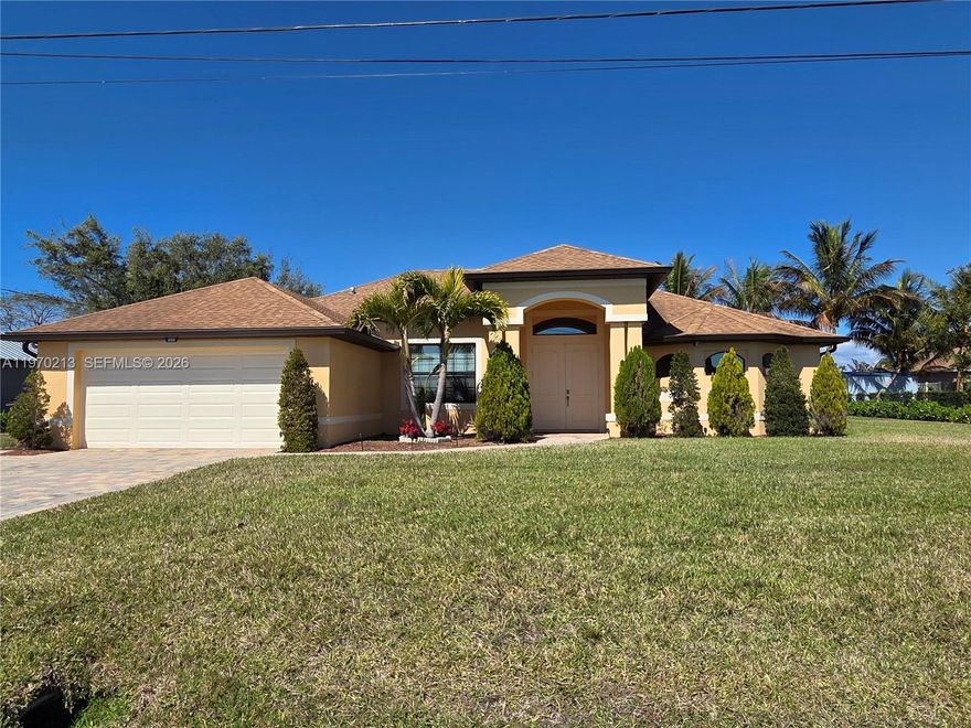 RARE TRIPLE LOT | FULLY FURNISHED TURNKEY | POOL HOME | 2018 BUILT
Welcome to your private retreat in desirable SW Cape Coral. Situated on an oversized triple lot, this 2018-built home offers space, privacy, and flexibility rarely available at this price point.
With 2,180 sq ft of living area, this residence features impact windows and doors, high ceilings, an open-concept layout, and abundant natural light throughout. The spacious living and dining areas flow seamlessly into a screened lanai and heated pool area — perfect for entertaining or relaxing year-round.
The concrete pool is equipped with a solar heating system, helping reduce energy costs while extending your swimming season. The oversized backyard offers exceptional privacy and room for future expansion, RV/boat parking, detached garage addition, or simply enjoying wide open green space — a true luxury in Cape Coral.
This home is being offered fully furnished / turnkey, allowing you to move in immediately or begin renting without the added expense and hassle of purchasing furniture. A significant added value compared to unfurnished homes in this range.
The kitchen features modern cabinetry, ample counter space, and an ideal layout for hosting. The primary suite offers direct lanai access, and generous closet space.
Built in 2018, this property provides the benefit of newer construction standards along with impact protection that may contribute to insurance advantages and long-term peace of mind.