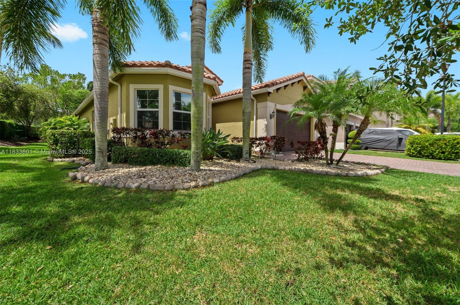 Welcome to this beautifully updated 3-bedroom, 3-bathroom home with an office/den and 2-car garage in the highly desirable gated community of Canyon Trails. This spacious home features a modern open-concept kitchen flowing into the great room, and a screened-in patio perfect for year-round outdoor living. Clubhouse includes a resort-style pool with cabanas, fitness center, indoor and outdoor basketball (with pickleball lines), tennis courts, kids' play area, card room, and a social room with catering kitchen. Zoned for top-rated schools, just 1 mile from Canyon District Park, and with easy access to the Florida Turnpike, this home offers the ideal blend of comfort, convenience, and lifestyle. Don’t miss your chance to live in one of West Boynton’s most sought-after communities!