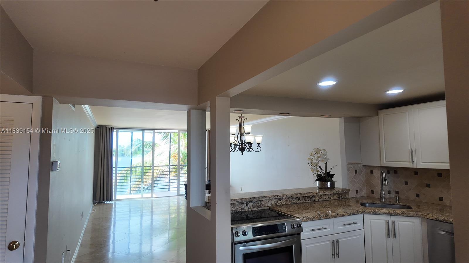 Beautifully appointed 3rd-floor condo with open layout, tile flooring throughout, and stainless steel kitchen appliances. Spacious bedroom, full bath, plus guest half-bath. Close Elevator access, on-floor laundry, and private storage for ultimate convenience. Peaceful lake views from your 3rd-floor unit. Minutes from Aventura Mall, Sunny Isles Beach, and Oleta River Park. Close to shops, dining, and major highways for easy access throughout South Florida. Perfect for first-time buyers, seasonal residents, or investors. This turnkey property offers waterfront living with modern convenience—your gateway to the South Florida lifestyle!