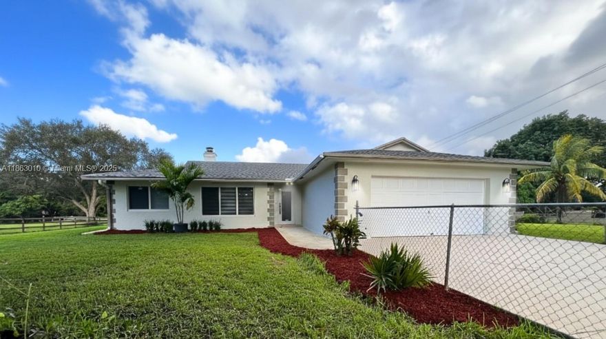 Stunning 4BR/2BA home with versatile office/5th bedroom, perfectly situated on a full builder’s acre in highly desirable Davie, FL—celebrated as ‘Horse Country’ for its rich equestrian heritage! Enjoy the freedom of no HOA and expansive space for all your toys—RVs, trailers, boats, horses, and pets. Inside, the home is beautifully remodeled, featuring a sleek, modern kitchen with quartz countertops, stainless steel appliances, updated cabinetry, stylish lighting, and tile floors throughout. Impact windows and doors offer comfort and peace of mind. A custom wine closet adds a unique, elegant touch for collectors and entertainers. Step outside to your private retreat with a sparkling pool, covered patio, and oversized yard—ideal for gatherings, barbecues, or simply unwinding