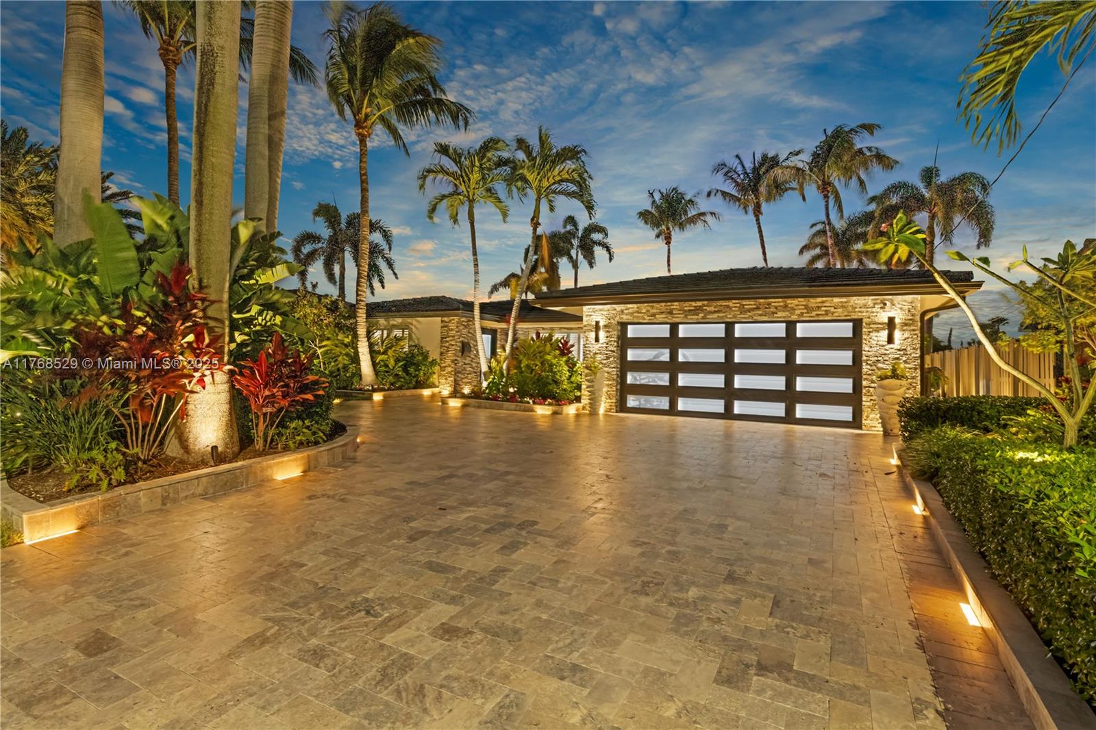 Sheek Marina-style luxury meets everyday comfort in this elegantly updated 3BD/2BA Wilton Manors home. Wake up to water views, spend your days poolside or lounging dockside under the stars. The spacious backyard offers multiple zones to relax, dine, or entertain—plus a 9,000-lb boat lift with direct ocean access and no fixed bridges. Inside, a designer kitchen with Wolf gas range, Sub-Zero appliances, and smart tech makes hosting effortless. New pavers, updated lighting, and curated outdoor living spaces create the perfect South Florida escape.