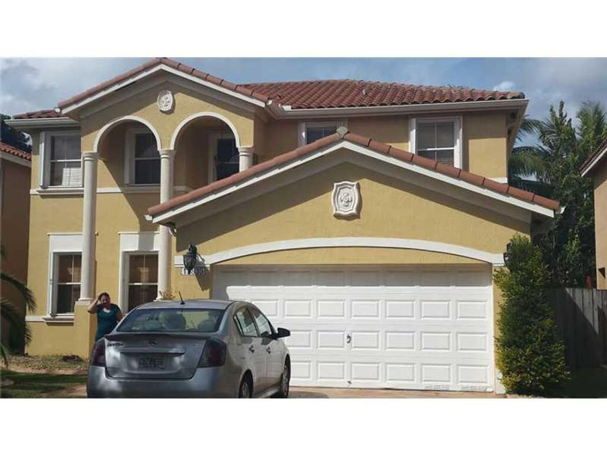 *** Regular Sale, Not Foreclosure or short sale***  Spectacular home in great conditions. Spacious kitchen with granite countertops, stainless steel appliances, High ceilings. Master bedroom his/her walk-in closets, sinks and bathrooms. Spacious closets,  with one full bed room down stairs, Great features. Beautiful terrace and gardens, Hurricane Shutters in all Windows, easy to show see broker remarks, Seller's motivated!