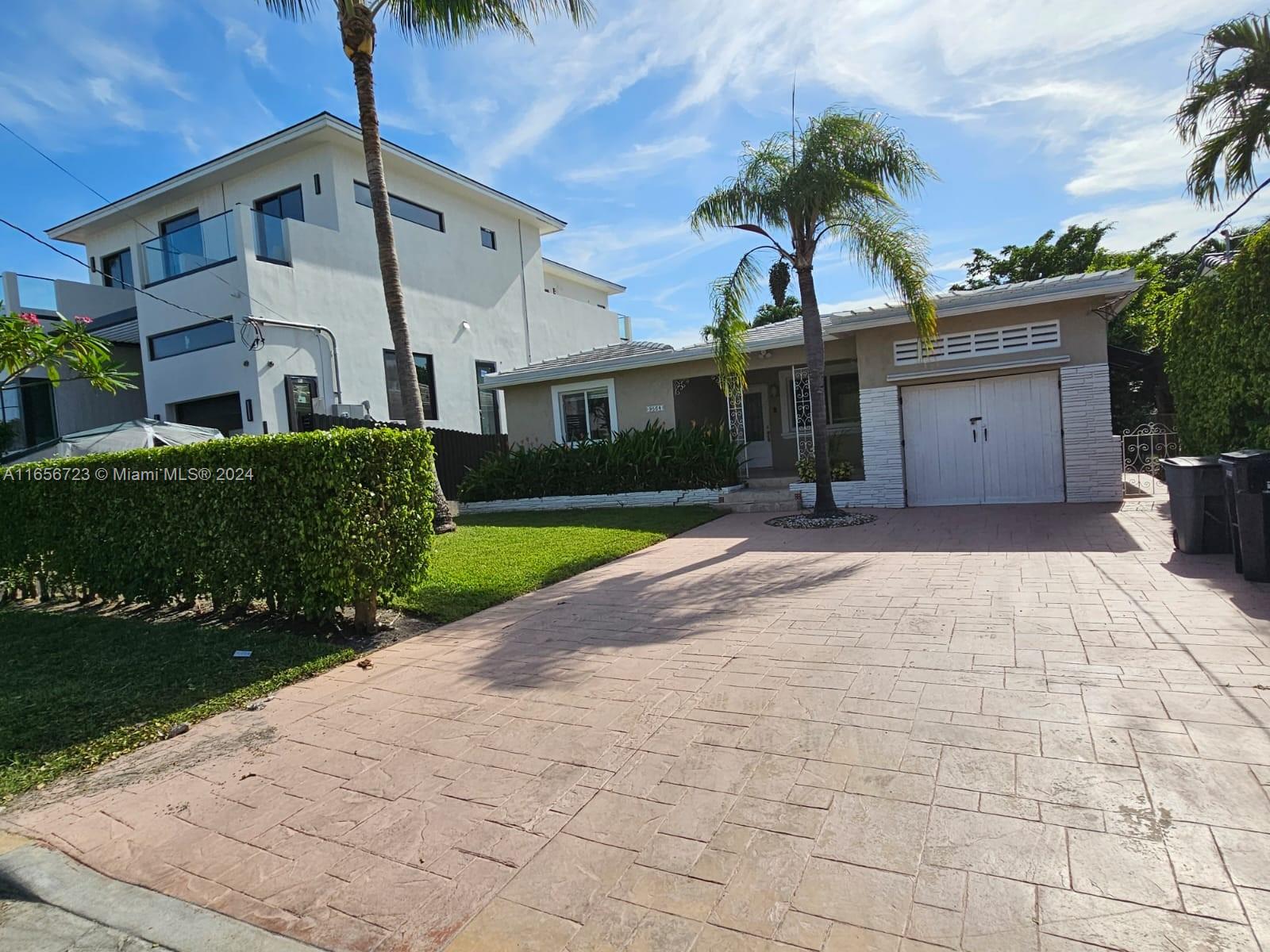 Rarely available, renovated and charming 3 bed / 3 bath home on the highly desirable cul-de-sac block of Carlyle Avenue, the best location in Surfside! Situated less than 1/2 block from the Bal Harbor Shops, and close walking distance to The Shul, Young Israel of Bal Harbor, Publix, multiple restaurants, galleries, & more. Remodeled with new flooring, appliances, countertops, high-impact windows... Excellent layout featuring a split floor plan, separate dining area, oversized bedrooms, laundry room, and a window-lined Florida room overlooking the spacious backyard. Call L.A for showings.
