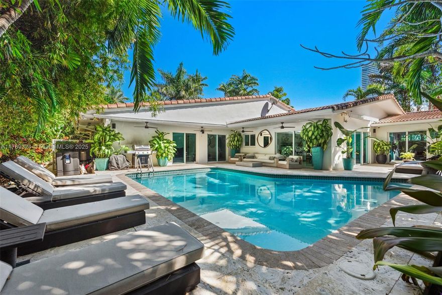 Welcome to 210 Ocean Blvd in the exclusive Golden Beach. This fully renovated, single-story ranch is pure zen—set on a massive 15,800 sq ft tropical oasis. The vibe is immaculate, with lush landscaping wrapping around a spectacular pool deck, creating total privacy. Inside, it’s all about good energy—open, airy, and effortlessly cool. The primary suite spills right out to the pool, making every morning feel like a resort getaway. And the best part? You’re just steps from the private beach. This is the kind of place that makes every day feel like a vacation.