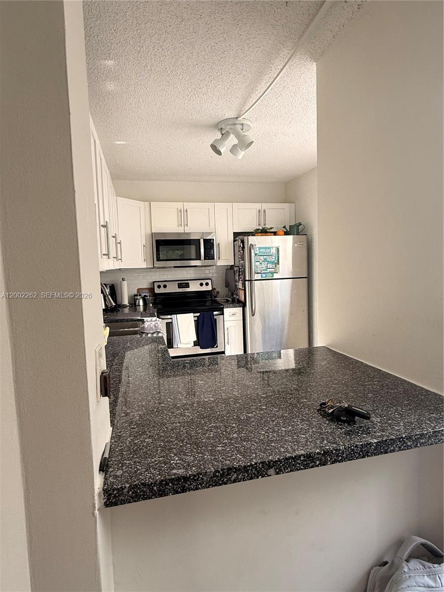 LIVE OAK CONDO SIX - Residential Lease