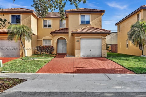 Photo of 13949 N Forest Oak Cir, Davie, FL 33325 (MLS # A12077940)