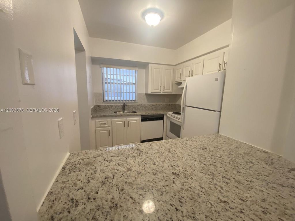 Photo of 6501 Winfield Blvd #A-53, Margate, FL 33063 (MLS # A12003576)
