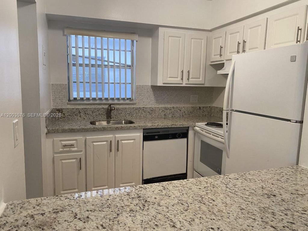 Photo of 6501 Winfield Blvd #A-53, Margate, FL 33063 (MLS # A12003576)