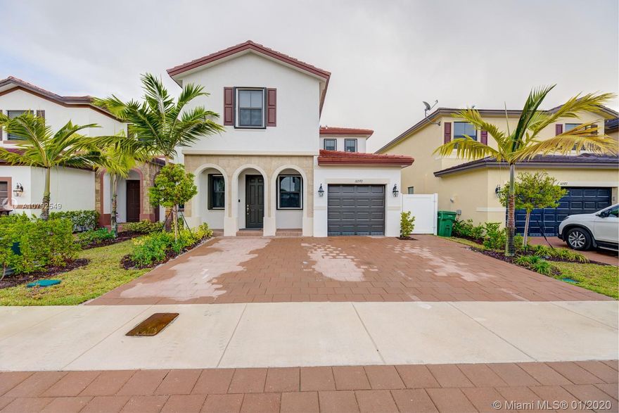 Welcome to your dream home in the desirable community of Aquabella. The Visola model features a spacious two-story 4 bedroom, 3.5 bath home which includes an independent 1/1 in-laws quarters with separate laundry room and private entrance. This Smart, Wi-Fi certified home comes equipped with Amazon and Alexa. The property has upgraded granite kitchen counter tops and stainless steel appliances, completely fenced yard and upgraded accordion shutters throughout. Move-In ready with window treatments included. This family-friendly lifestyle community features a clubhouse with social room, resort-style pool, kids water park, outdoor grilling stations, state-of-the-art fitness center, game room, and much more. Great schools, shopping, restaurants and easy access to major highways.