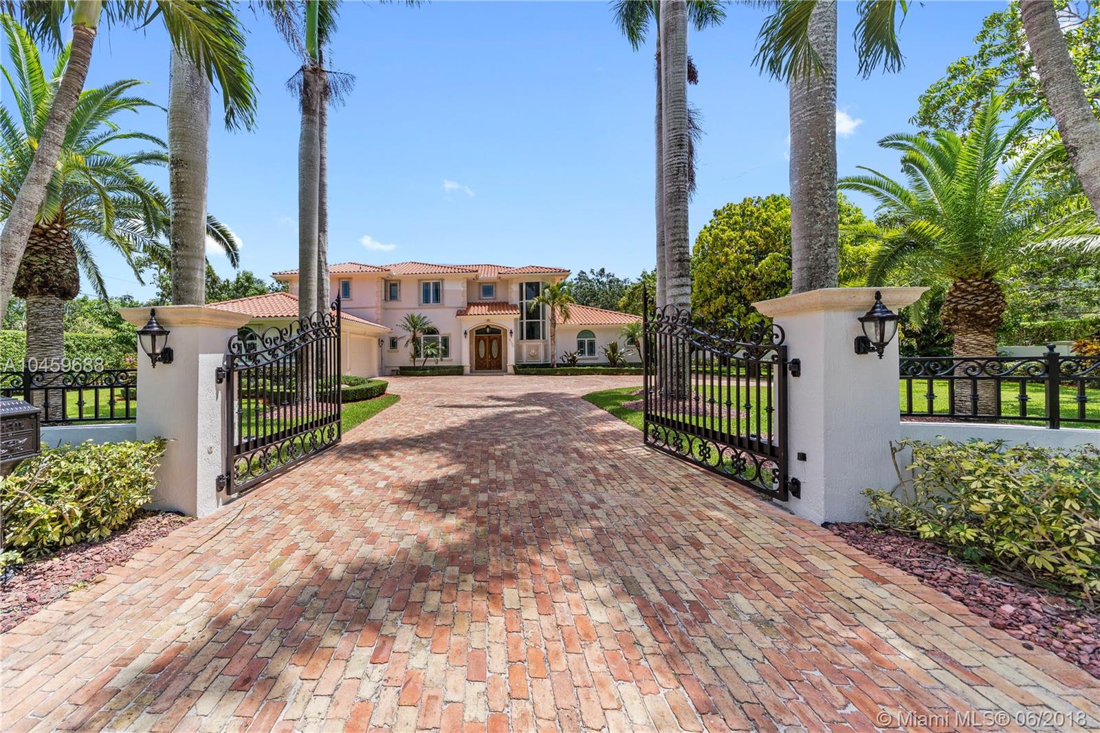 Beautiful gated acre estate in North Pinecrest 6 bedroom 6 1/2 baths plus 3 car garage. Saturnia marble and natural maple floors. Pool and Jacuzzi. Propane gas generator to power house for a month. Best public and private schools.
