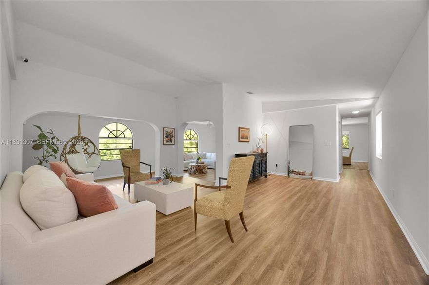 Located in the heart of Cutler Bay’s desirable Saga Bay community, this 3-bedroom, 2-bath home features a bright, open-concept design with volume ceilings and an inviting courtyard-style entrance for added privacy and curb appeal. Designed for comfortable living and entertaining, the residence offers a formal dining room, spacious bedrooms, a primary suite with separate tub and shower, generous closet space, an indoor laundry room, and a 2-car garage. The expansive backyard provides ample space for a future pool. Conveniently located near shops, restaurants, parks, and the Turnpike. A wonderful opportunity to enjoy one of Cutler Bay’s true gem neighborhoods.