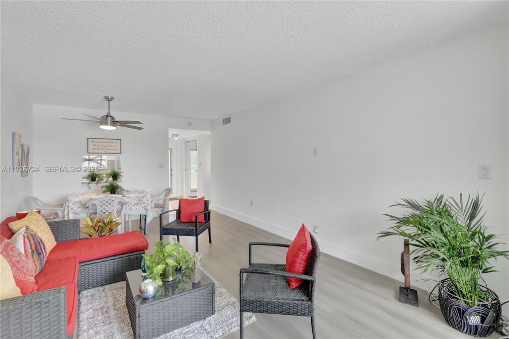 Photo of 8350 Sunrise Lakes Blvd #205, Sunrise, FL 33322 (MLS # A11926724)