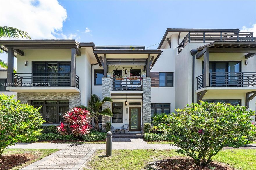 Welcome to luxury living in the heart of Downtown Doral. This stunning 3 story townhouse offers 4 bedrooms, 3 full bathrooms and a powder room across 2,456 sq ft of thoughtfully designed space, including a spectacular private rooftop terrace complete with a BBQ area, perfect for entertaining or unwinding while enjoying the vibrant surroundings. Built in 2018, the home blends modern architecture with a functional layout ideal for both everyday living and hosting. The chef’s kitchen is a true centerpiece, featuring premium appliances and quartz countertops. Open concept living areas flow seamlessly, enhanced by impact windows and doors for security, comfort and energy efficiency. The multi level design provides privacy and flexibility, complemented by upscale finishes throughout and quality craftsmanship in every detail. Ideally located in one of Doral’s most sought after communities, just steps from top rated schools, restaurants, shops, parks, and everything Downtown Doral has to offer. Residents also enjoy access to a resort style clubhouse featuring a state of the art fitness center, elegant social spaces and a beautiful pool area designed for relaxation and entertaining. Move in ready and designed for the lifestyle today’s buyers want, perfectly positioned next to a serene green space, this home truly stands out!