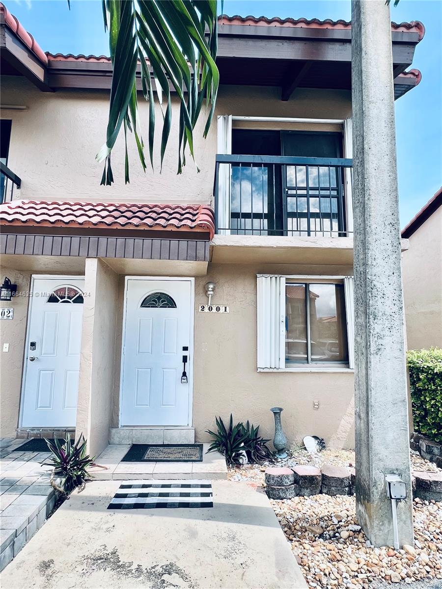 Discover this inviting 3-bedroom, 2.5-bath townhome in the highly desirable FIU area. This charming home boasts marble-tiled floors throughout, a BRAND NEW updated kitchen and bathrooms, and fresh paint to give it a modern feel. The spacious backyard is perfect for relaxing or hosting afternoon BBQs with family and friends, with a NEW fence and patio roof covering coming soon. Located in a quiet neighborhood, the unbeatable location is just across from FIU, with easy access to nearby shops and restaurants. Small dogs (up to 35lbs) are welcome per association rules. With easy access off 107 AV and a smooth showing process, this home is ready for you to move in. Schedule your viewing today and make this cozy townhouse your new retreat!