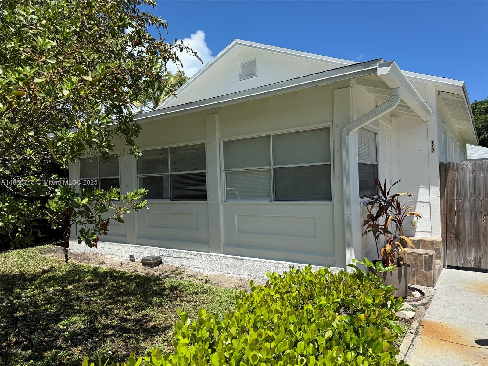 Updated 2 bedroom PLUS den/office home in great location close to Downtown Lake Worth Beach, 1-95, parks and the BEACH! Open floorplan with wood tile flooring throughout, huge living/dining room, remodeled kitchen with stainless appliances, GAS stove, washer and dryer, 2 remodeled bathrooms. Nice patio area for entertaining. Freshly painted and ready to move in! Tenant pays all utilities and must show good credit report, proof of income and 1st month, last month and 1 month security deposit. Pets ok with pet fee, non-aggressive dog breeds only.