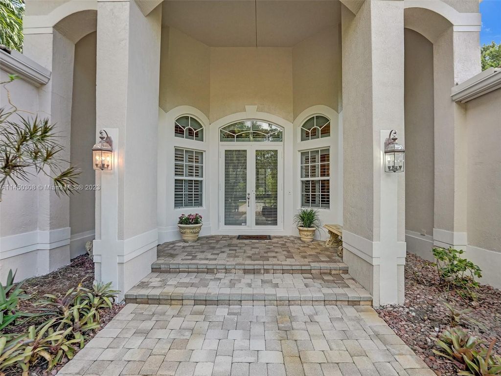 Photo of 5906 NW 66th Ave, Parkland, FL 33067 (MLS # A11450308)