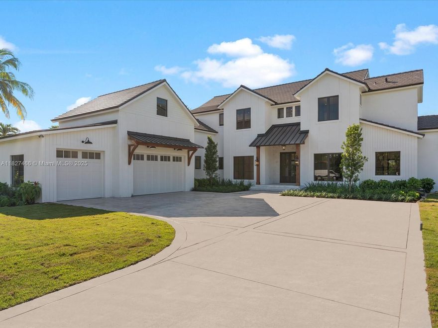 Discover modern elegance in this brand-new, expanded 5-bedroom, 5.5-bath estate encompassing 5,689 sq. ft. of luxury living space. The interior boasts an additional versatile room and a dramatic spiral staircase, impact windows throughout, a living room with soaring ceiling height and a cozy butane fireplace. High-end stunning kitchen that would make any chef blush featuring Wolf gas range, double islands and dual sinks, walk-in pantry, wine bar with cooler, walk-in coffee bar, and a well-designed laundry room. Step outside to your private cabana, complete with a built-in BBQ and sink, perfect for entertaining. A stunning below-ground pool and 3-car garage complete this exquisite home. Located in a desirable neighborhood, this property defines modern luxury. Schedule your showing today!