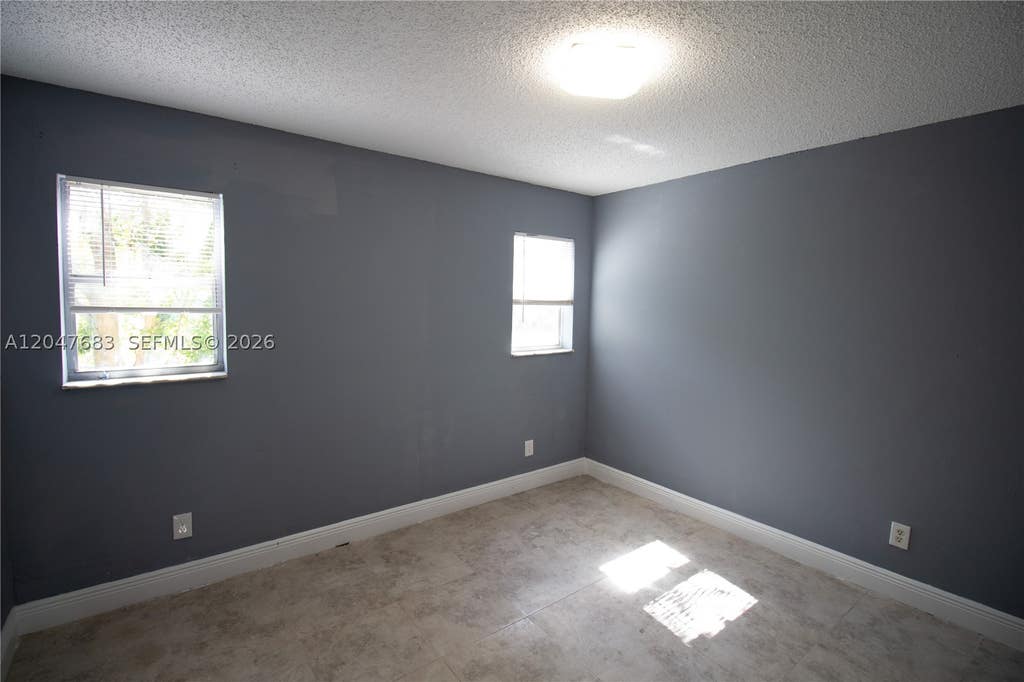 Photo of 825 SW 10th St #B, Hallandale Beach, FL 33009 (MLS # A12047683)