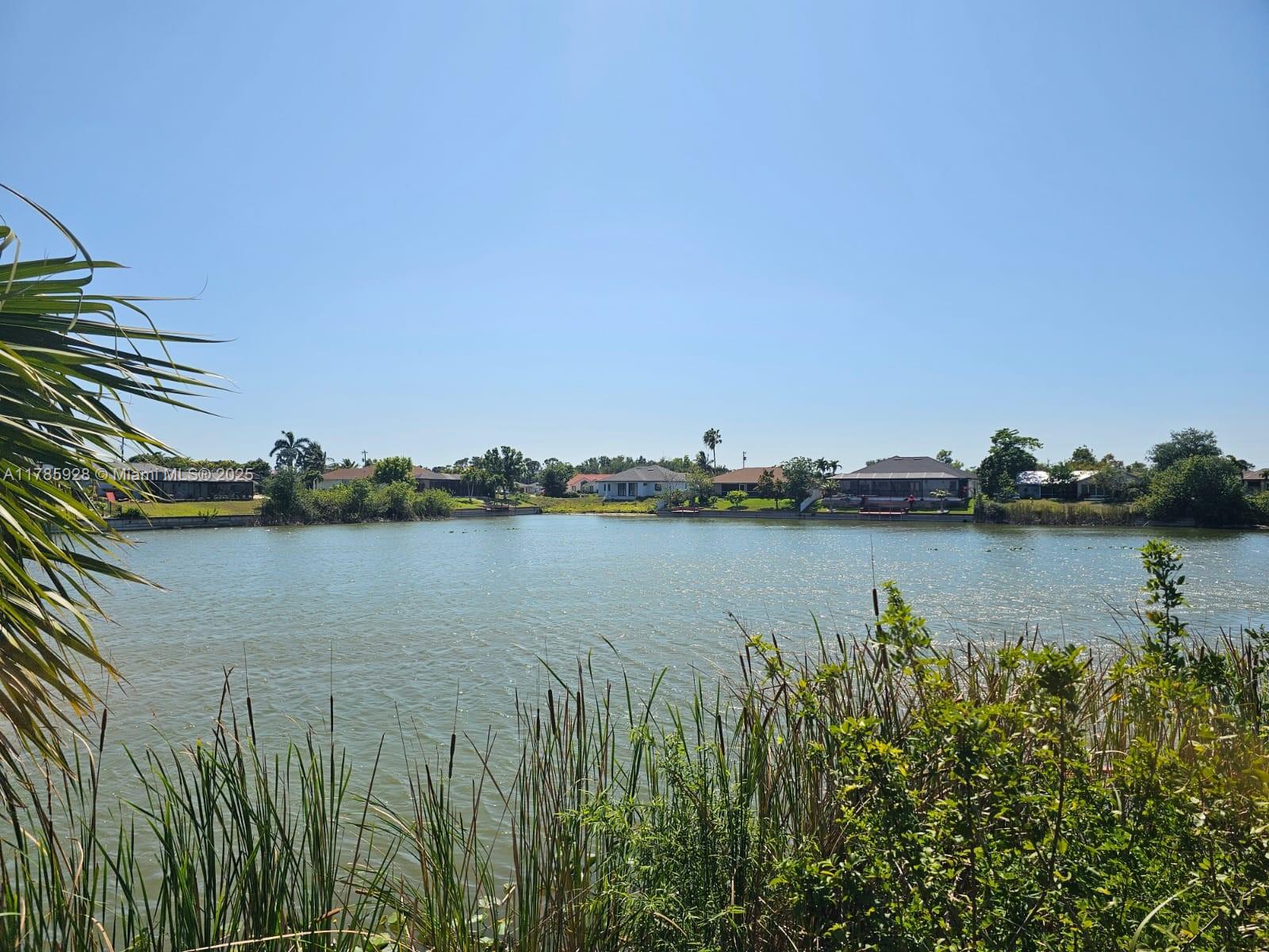Residential extra wide waterfront & city center lot. No Flood Zone. All assessments in and paid! Survey available. Excellent location, close to everything, restaurants, shopping centers, Just 1.5 miles to Sun Splash Family Waterpark, 0.8 miles of Hunter's Run Golf Club, 2.6 miles from Cape Coral Hospital, 1.6 miles of City Hall and so on.