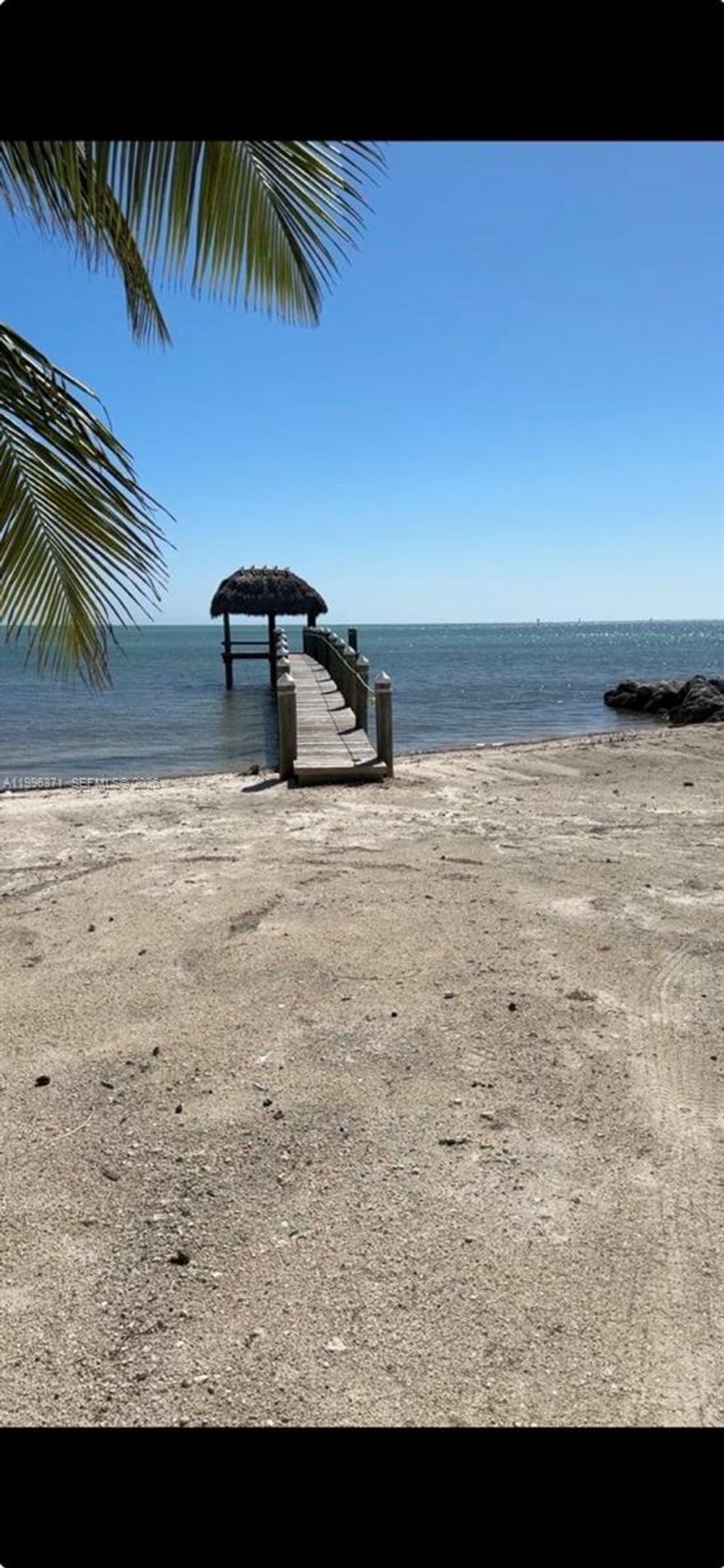 Presenting a breathtaking piece of land in the most desired strip of Islamorada—surrounded by multi-million-dollar homes and directly across from famous Robbie’s. 
With the most crystal-clear waters of Islamorada, protected and surrounded by natural reef, this property boasts 100 feet by 244 feet of private beach /oceanfront and  direct views of the beautiful Alligator Reef. It already comes with permits for an astonishing home. Imagine owning your piece of paradise in beautiful Islamorada —complete with dock with tiki hut and unparalleled ocean views. To inquire, 
. Don’t miss this rare opportunity to build your dream oasis.”