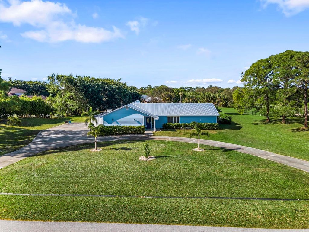 Photo of 3525 SW Racquet Club Way, Palm City, FL 34990 (MLS # A11336937)