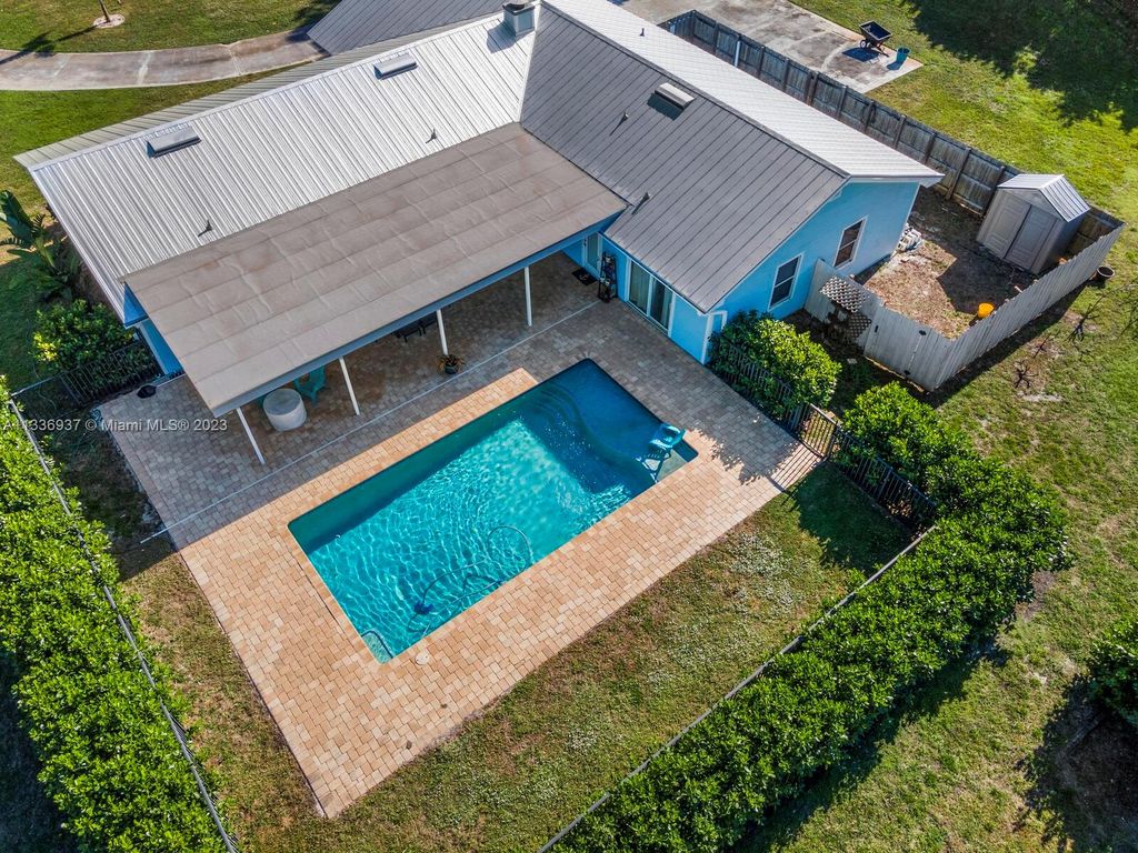 Photo of 3525 SW Racquet Club Way, Palm City, FL 34990 (MLS # A11336937)