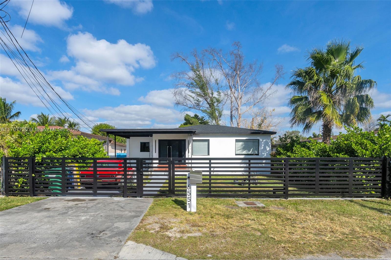 Welcome to Coral Terrace! This fully renovated modern home is a rare find in this neighborhood! Enjoy peace of mind with a brand new roof, impact windows & doors. Envision endless possibilities with a spacious yard—perfect for a pool, outdoor play area, or even a home addition! Located directly across a top-rated A school in a quiet, friendly neighborhood makes it perfect for families. Additionally, the property includes an efficiency generating $1,400/month in rental income, offering fantastic potential for extra cash flow or multi-generational living. Conveniently located near parks, shopping, dining, and major highways, this home combines convenience, style and opportunity. Whether you're an investor or an end user, the potential here is limitless. Don’t wait—Schedule your tour today!