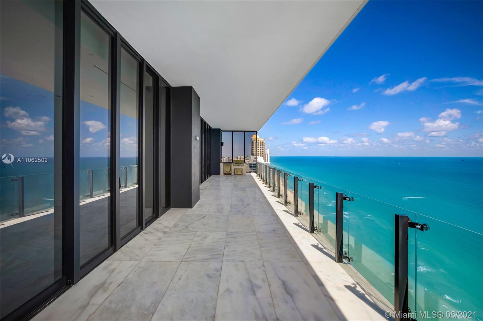 Enjoy unobstructed direct ocean views from this high floor corner residence in Muse Sunny Isles Beach. This never lived in 3bed/3.5 bath + den smart home has some of Sunny Isles best panoramic views. Muse is known for its sleek and modern design, with #3401 boasting interior features such as: a private foyer entry, 12’ ceilings, book-matched Italian kitchen cabinetry, marble floors throughout, and an expansive living area. Exceptional principal suite w/midnight bar & spa-like bath. Expansive walk-in closet w/leather inserts & up lighting. Uniquely large outdoor terrace w/summer kitchen. Amenities include infinity edge pool, breakfast for owners, food/beverage service, house car, automated parking system, sauna & fitness center.