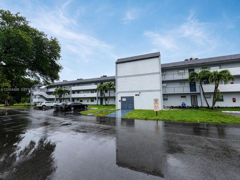 Photo of 8421 Lagos De Campo Blvd #301T, Tamarac, FL 33321 (MLS # A12004488)