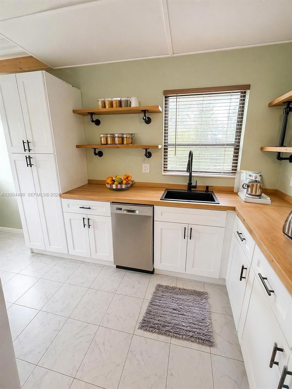 Photo of 8421 Lagos De Campo Blvd #301T, Tamarac, FL 33321 (MLS # A12004488)