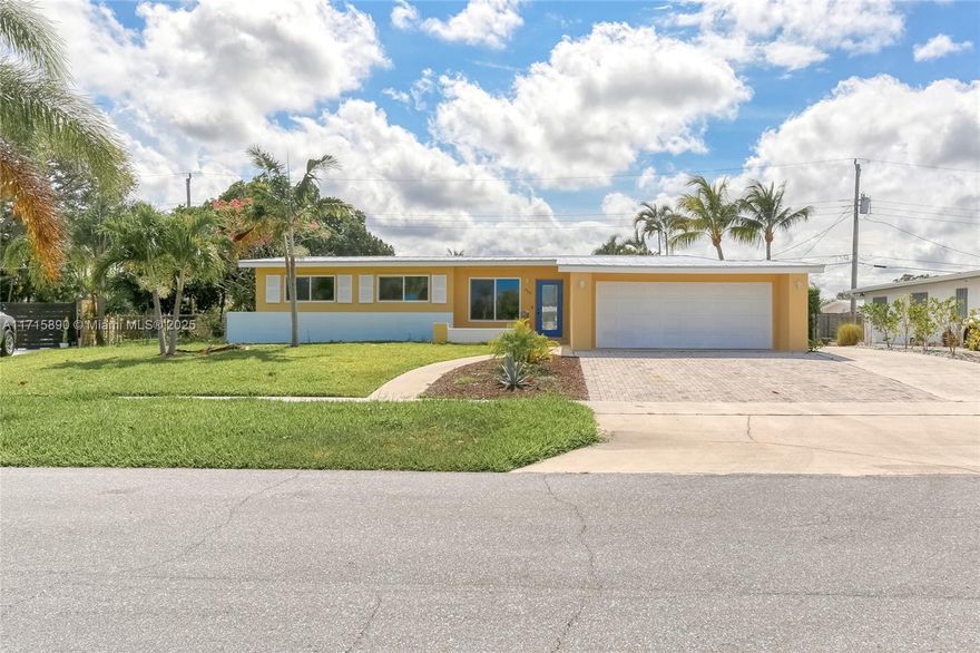 Beautifully updated single family home in North Palm Beach. 4 Bedrooms, 2 bathrooms, with a 2 car garage. Completely updated in 2023. Metal Roof updated in 2024. A/C is 2023. 4 Bedrooms, 2 bathrooms, with a 2 car garage. Completely updated in 2023. Metal Roof updated in 2024. A/C is 2023. Impact windows and doors bring in natural light. SS appliances. White wood cabinets with quartz counter-tops. The master bedroom has a walk in closet. Double vanities in the master bathroom. room for a pool.  A Pavered driveway and patio. Nothing to do but bring your things and move in.