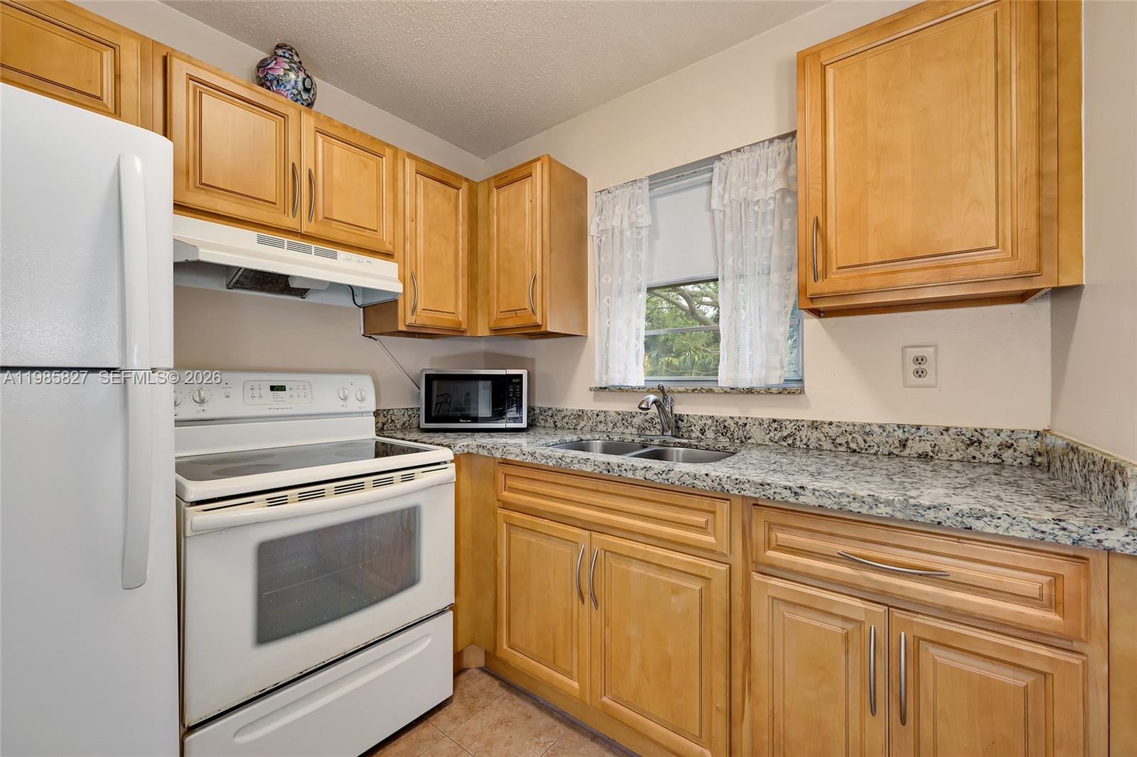 SHEFFIELD CONDOS A TO Q - Residential