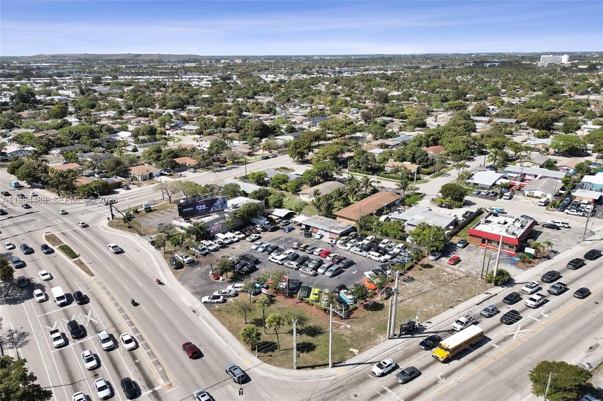 Prime commercial opportunity located on highly trafficked Copans Road in the heart of Pompano Beach. This property is currently operating as a successful auto dealership, making it an ideal turnkey opportunity for automotive users or investors seeking a high-visibility location.
Zoned B-4 (Heavy Business District), the property allows for a wide range of commercial uses including automotive sales, service, retail, showroom, and other high-intensity business operations. The site benefits from excellent exposure, strong traffic counts, and proximity to major thoroughfares, enhancing both accessibility and business potential.
Additionally, the property may offer future redevelopment potential. Buyers are encouraged to conduct their own due diligence with the City of Pompano Beach to verify zoning regulations, permitted uses, density, height restrictions, and any applicable redevelopment or mixed-use opportunities.
The property features approximately 1,000 square feet of functional office space, including two private offices and a garage. Designed with automotive operations in mind, the site offers two covered work areas suitable for servicing and detailing vehicles. A vehicle lift is also included in the sale, providing added value and turnkey capability for automotive users.
